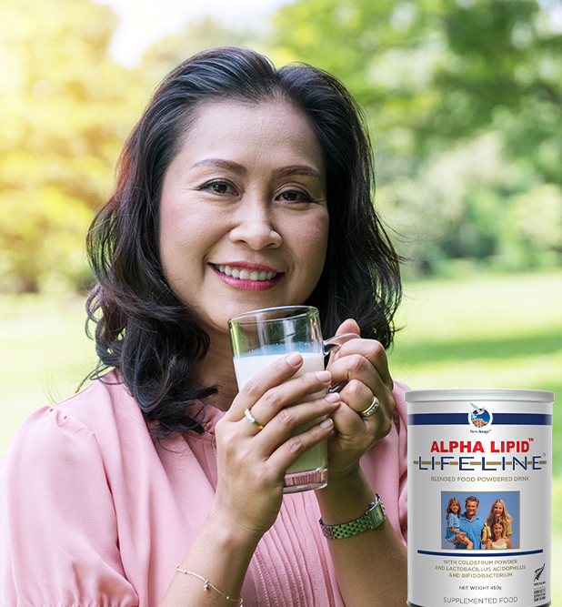 Healthy drink lifestyle concept. Senior woman 50 s hands holding Healthy drink lifestyle concept. Senior woman 50 s hands holding a glass of fresh milk in the park.